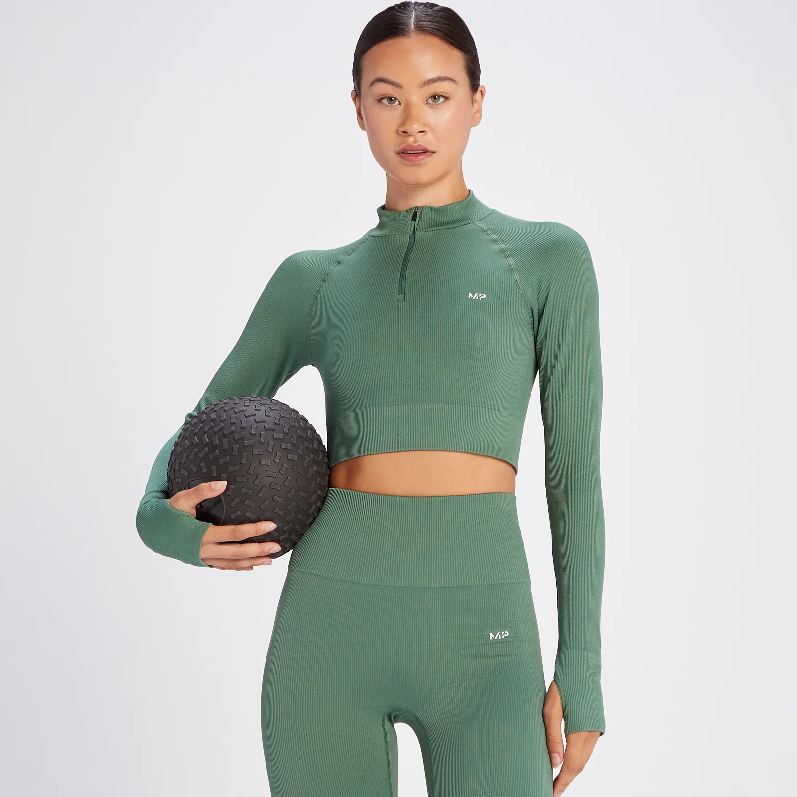 MP Ženska brezšivna rebrasta kratka majica z 1/4 zadrgo Tempo – Soft Pine - XS Slika 1
