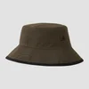 Obojestranski klobuk Bucket MP – črna/gozdno zelena